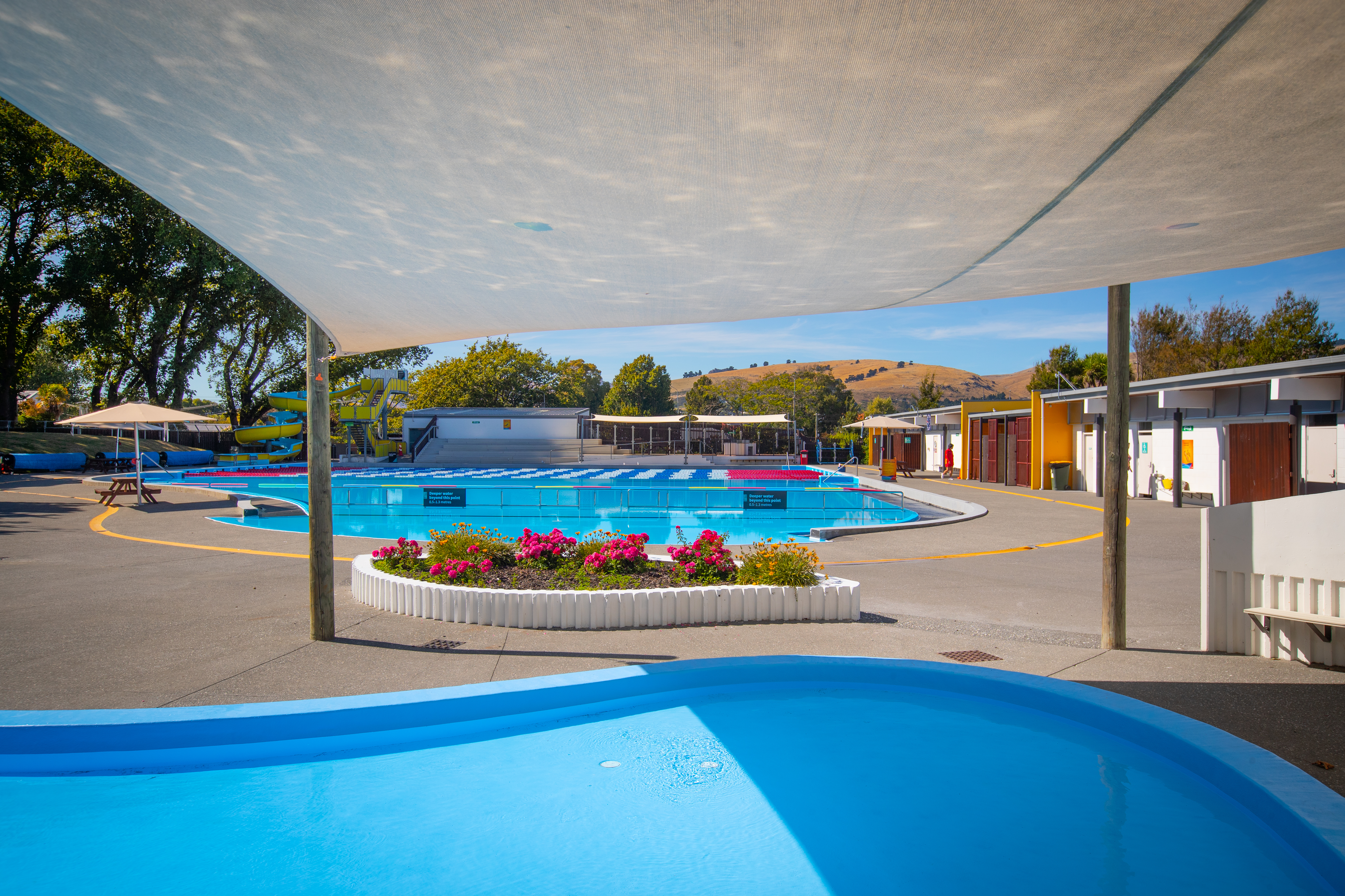 Waltham summer pool with shaded toddler pool. 