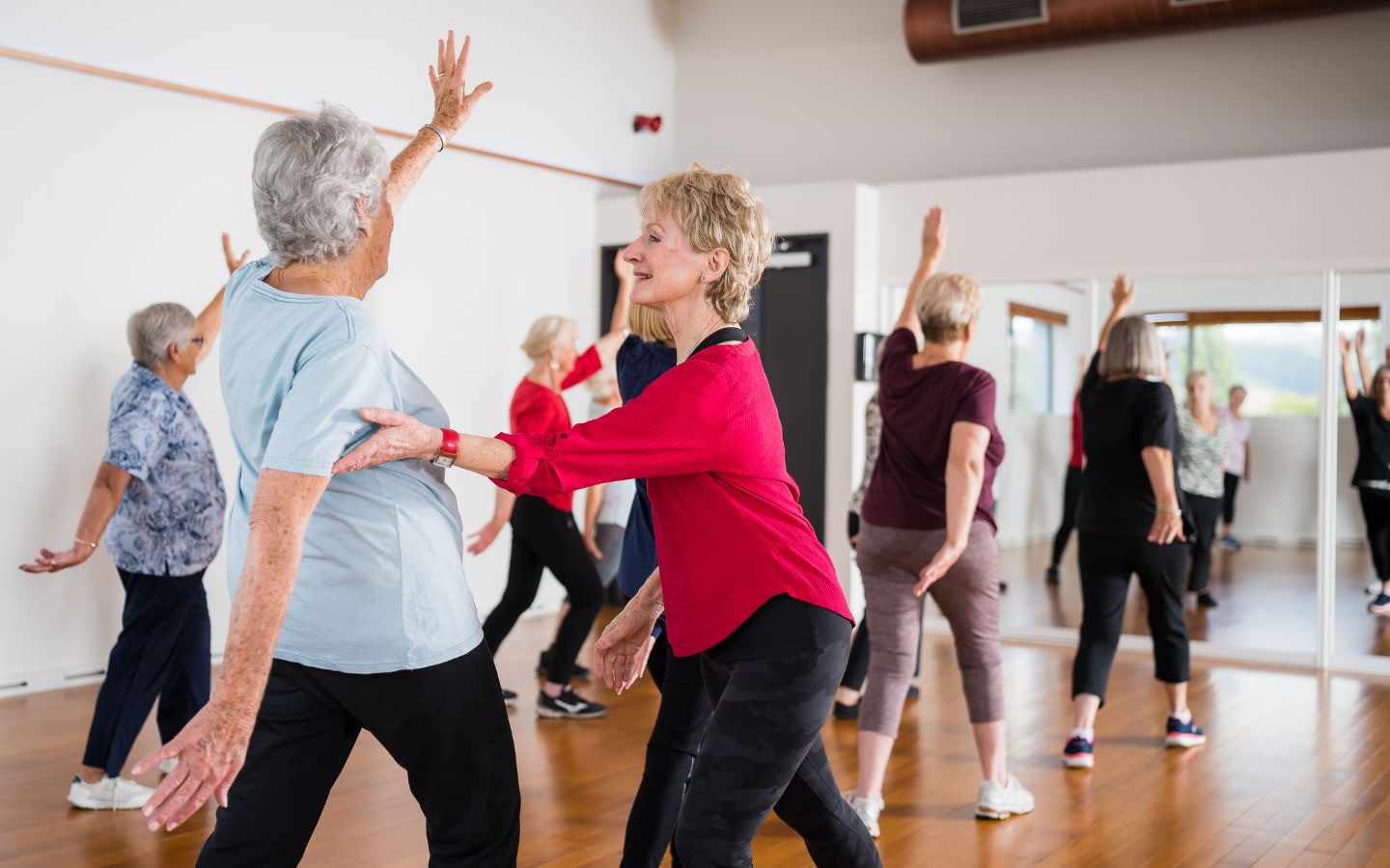 A group of elderly women participating in a gentle exercise class at Christchurch Recreation and Sport centre. 