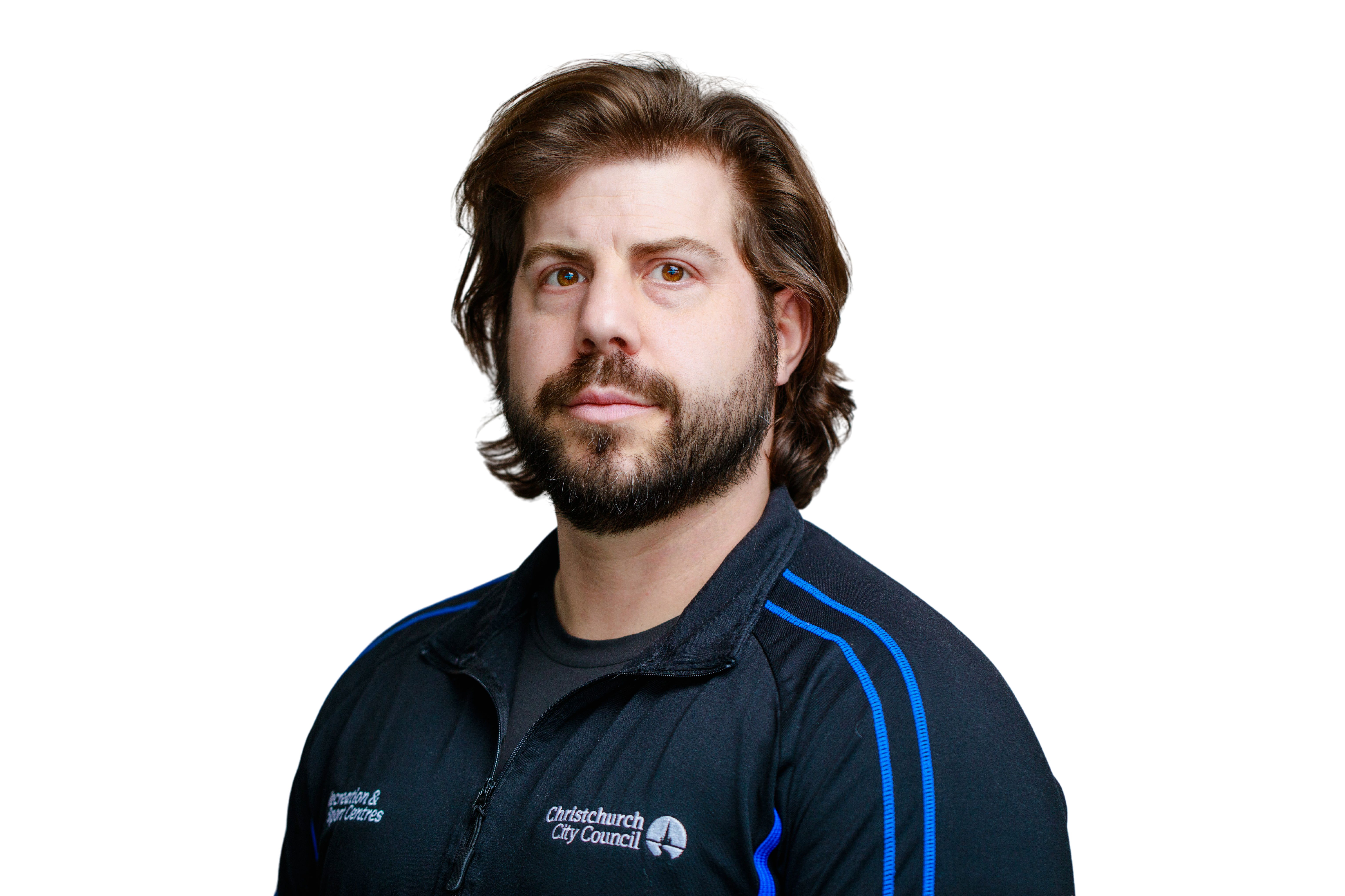 Personal trainer Ronald Fisher in a blue and black staff uniform. 